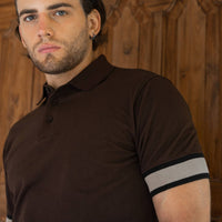 Model wearing an LCY Polo, with contrast ribbed and cuffs