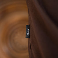 Model wearing an LCY Polo, with contrast ribbed and cuffs