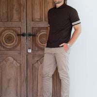 Model wearing an LCY Polo, with contrast ribbed and cuffs