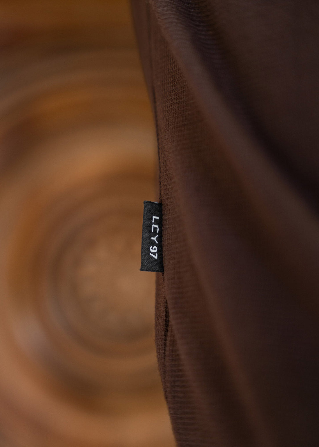 Model wearing an LCY Polo, with contrast ribbed and cuffs