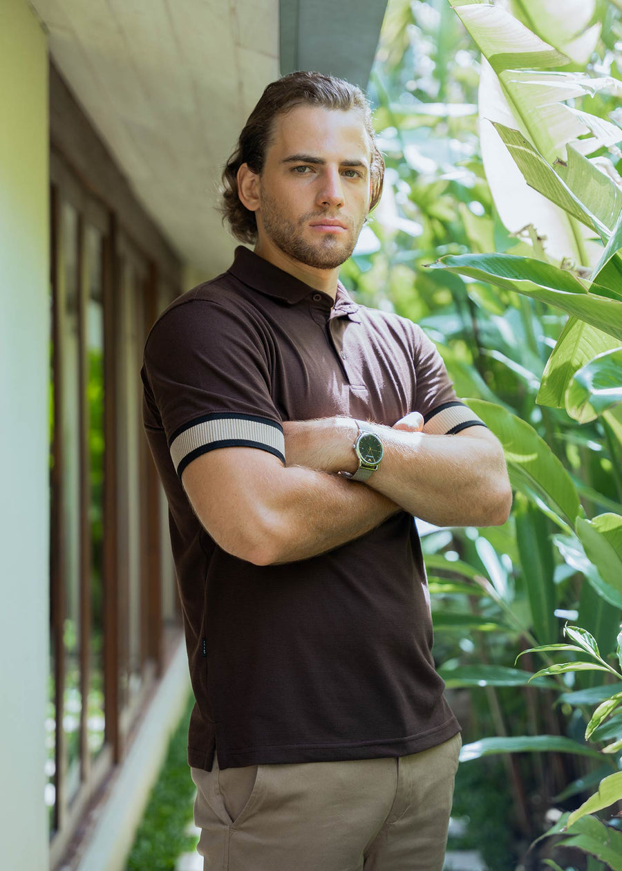 Model wearing an LCY Polo, with contrast ribbed and cuffs