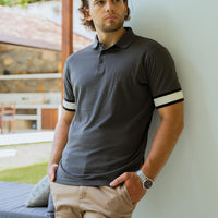 Model wearing an LCY Polo, with contrast ribbed and cuffs
