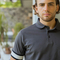 Model wearing an LCY Polo, with contrast ribbed and cuffs.